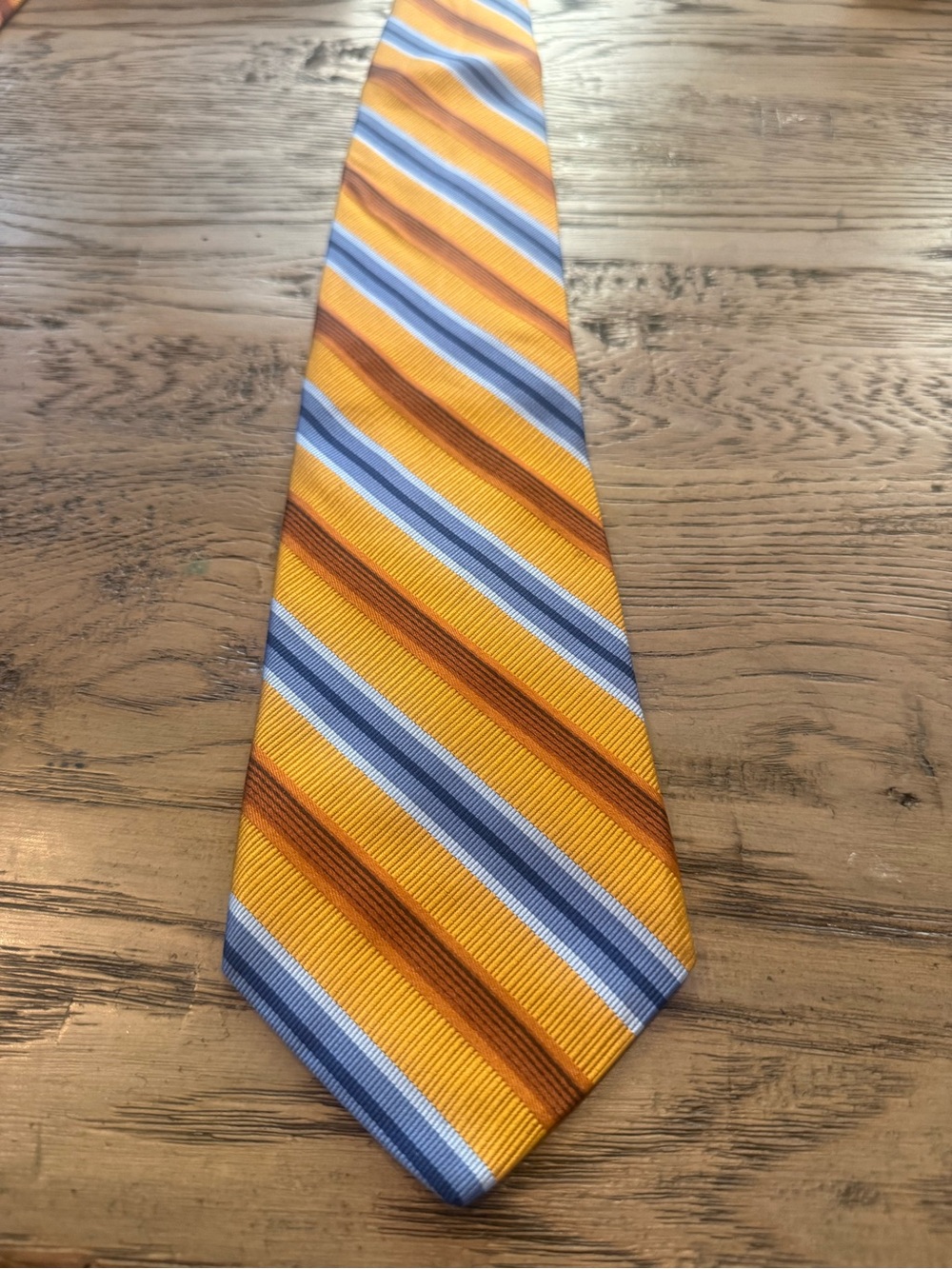 Tom James Men's Yellow Striped Silk Tie with Blue and Brown Accents